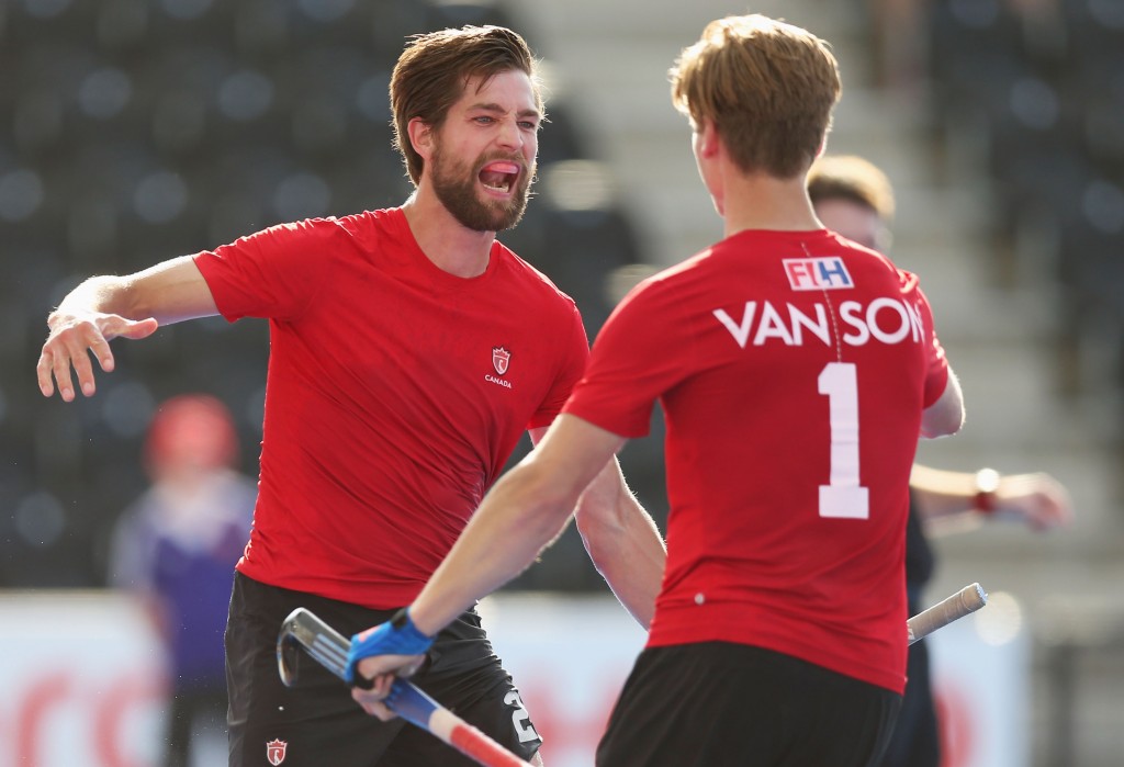 LONDON, ENGLAND - JUNE 16: Iain Smythe of Canada celebrates as he scores their second goal with Foris Van Son (1) during the Hero Hockey World League Semi-Final Pool B match between Pakistan and Canada at Lee Valley Hockey and Tennis Centre on June 16, 2017 in London, England. (Photo by Alex Morton/Getty Images)